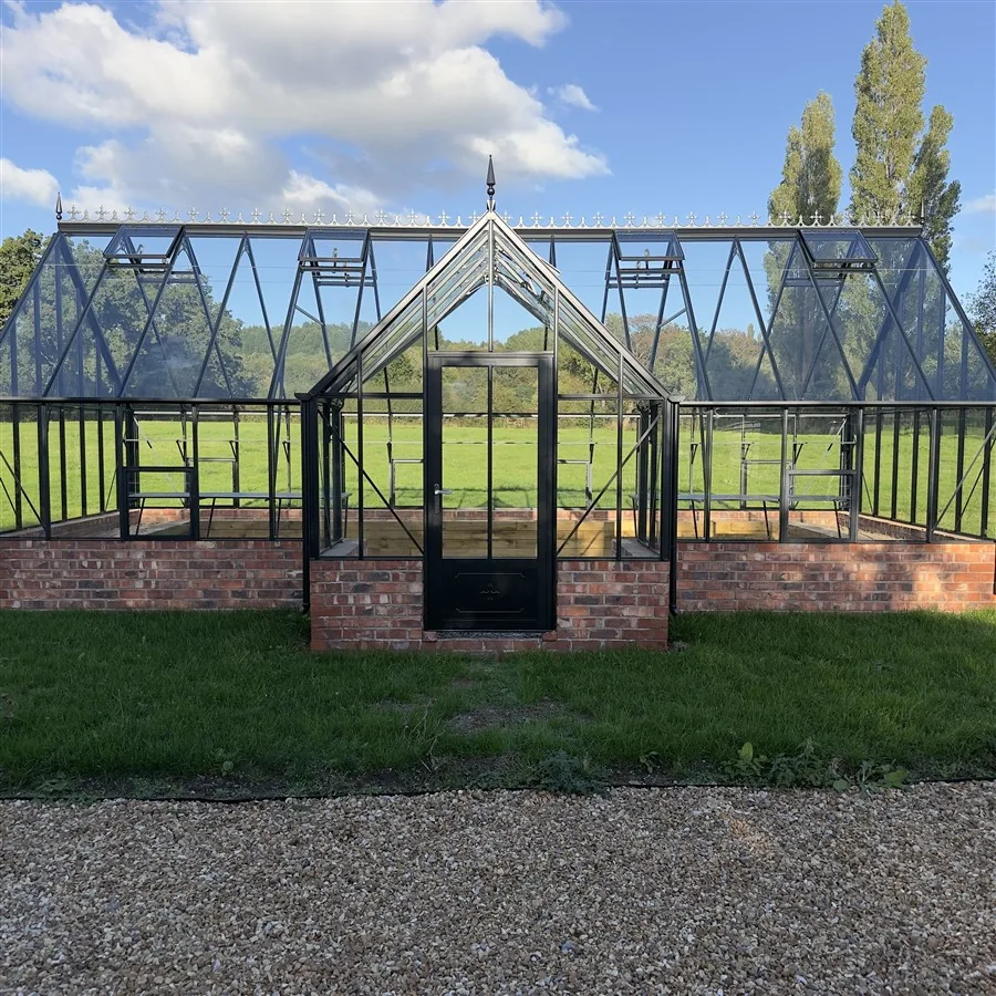 Completed greenhouse photographed from the front